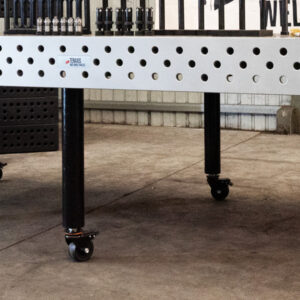 Standard round fixed leg with caster wheel on a 1500x3000mm ESS Raw Cast Iron table